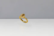 Todd Reed ring in 18karat yellow gold with set with natural brown diamond(1.53cts) and white brilliant cut diamonds(.30cts)